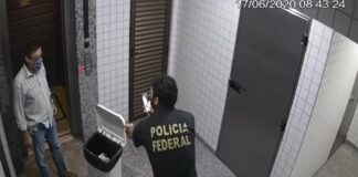 Vídeo mostra conselheiro do TCE-MT descendo escadas para jogar quase R$ 500 mil em cheques em lixeira durante operação