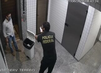 Vídeo mostra conselheiro do TCE-MT descendo escadas para jogar quase R$ 500 mil em cheques em lixeira durante operação